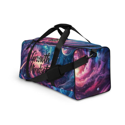 Cosmic "Growth Mindset" Duffle Bag – Ideal for Gym, Travel, and Everyday Use. Featuring a vibrant galaxy print, this spacious duffle bag offers durable construction, an adjustable shoulder strap, and secure zippered compartments for all your essentials. Perfect for those who embrace a growth mindset in all aspects of life.